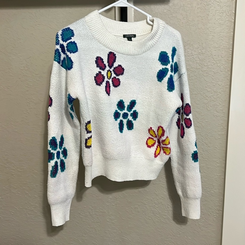 Woman’s floral sweater